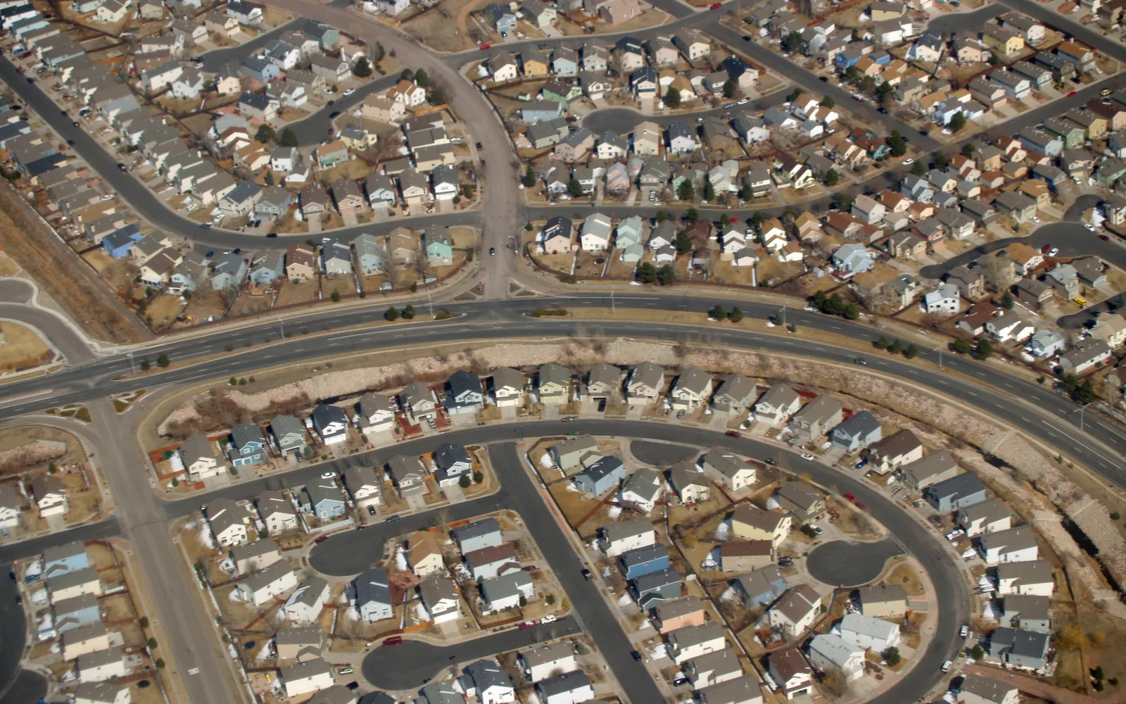 Aerial view of suburban residential neighborhood showing tract housing and residential development